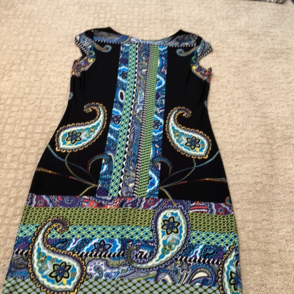 Fabulous black dress with fun pattern. - Picture 7 of 13